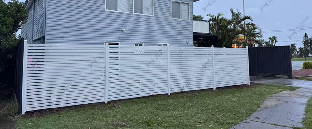 White driveway fence